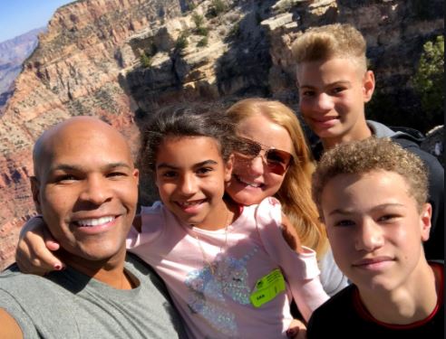 Jerome Adams with his wife and children