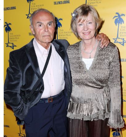 John Saxon and his wife Gloria Martel | Source: GettyImages